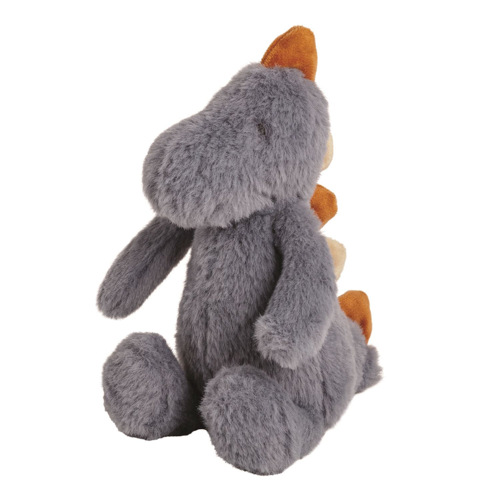 Gray plush stegosaurus dinosaur toy with orange spikes.