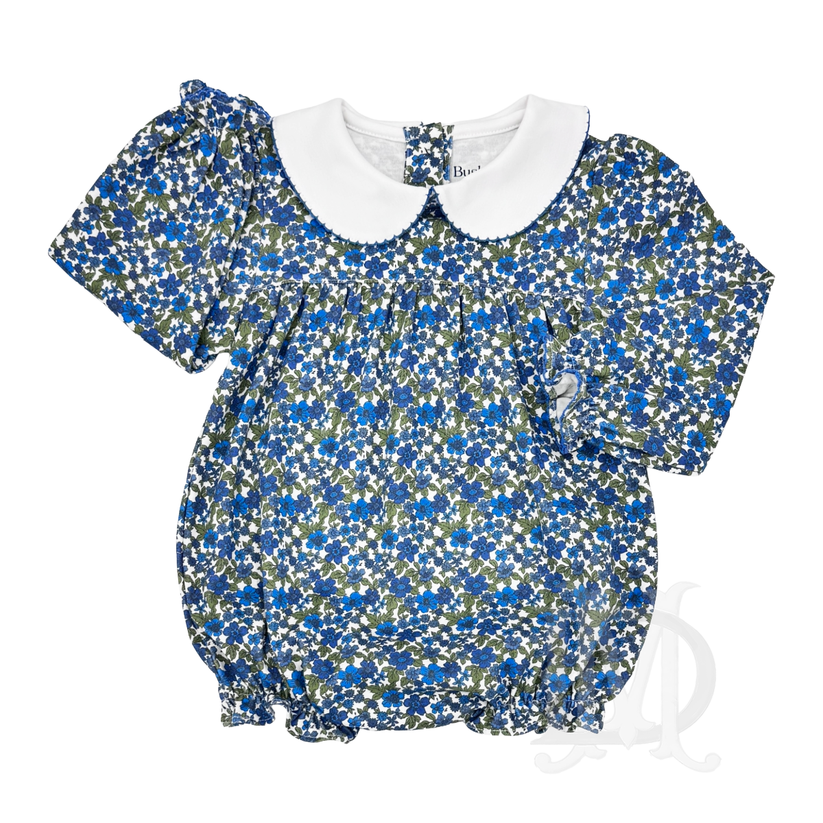 A long-sleeve baby girl bubble with a blue, white, and olive green floral print, featuring a white Peter Pan collar.