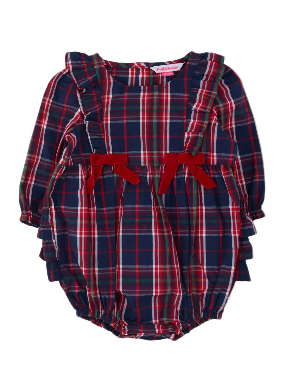A baby girl's long-sleeve romper in a navy blue, red, and white plaid pattern, featuring ruffled shoulder straps, red ribbon bows at the waist, and a ruffled hem, shown against a plain light gray background.