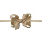 Oatmeal hair bow on a thin headband