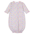 Baby girl converter gown with a bright floral pattern and Kissy Kissy brand label