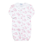 Baby girl's converter gown in a pink toile print with a white ruffled collar.