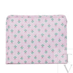 A pink and green floral print cosmetic pouch travel bag organizer.