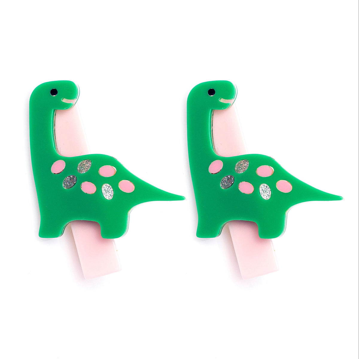 Green dinosaur-shaped acrylic hair clips for little girls.