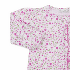 A baby girl pink footed sleeper closeup with a Kissy Kissy brand label, floral print, a ruffle down the zipper front, hot pink trim, and mitten cuffs.