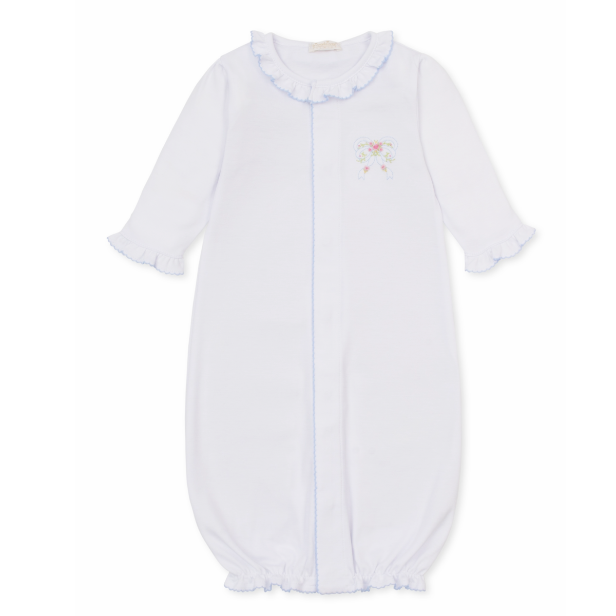 A white long-sleeve baby girl sleep sack with ruffled collar and cuffs, light blue trim and a delicate embroidered bow with pink rosettes. 