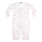 Baby girl's white converter gown romper in a pink puppy dog print with a white ruffled collar.