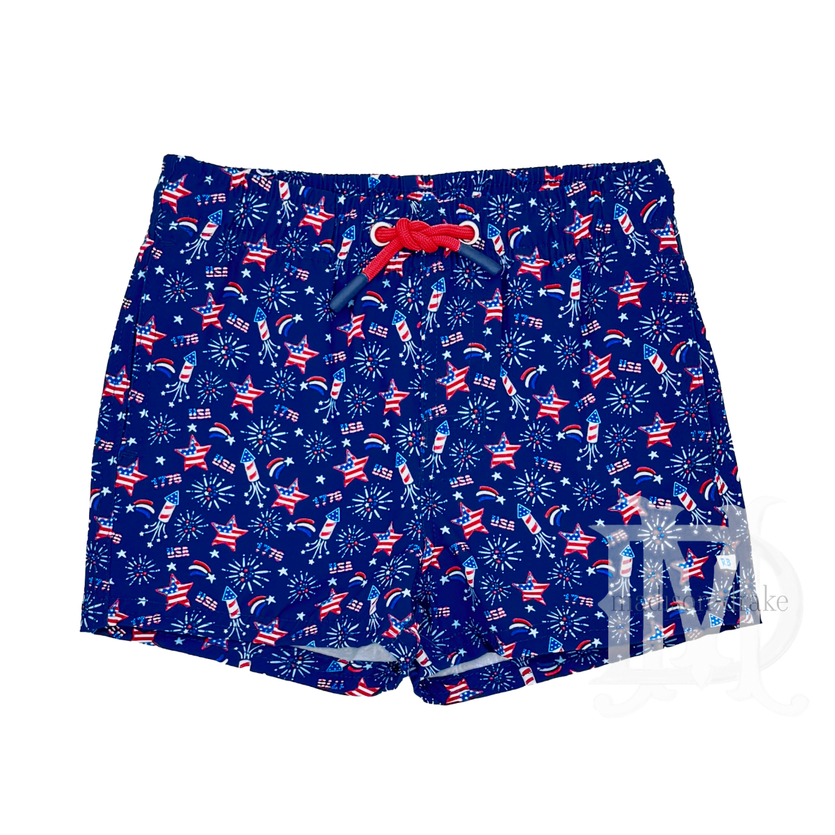 Boy's dark blue patriotic swim shorts with American flag and fireworks pattern.