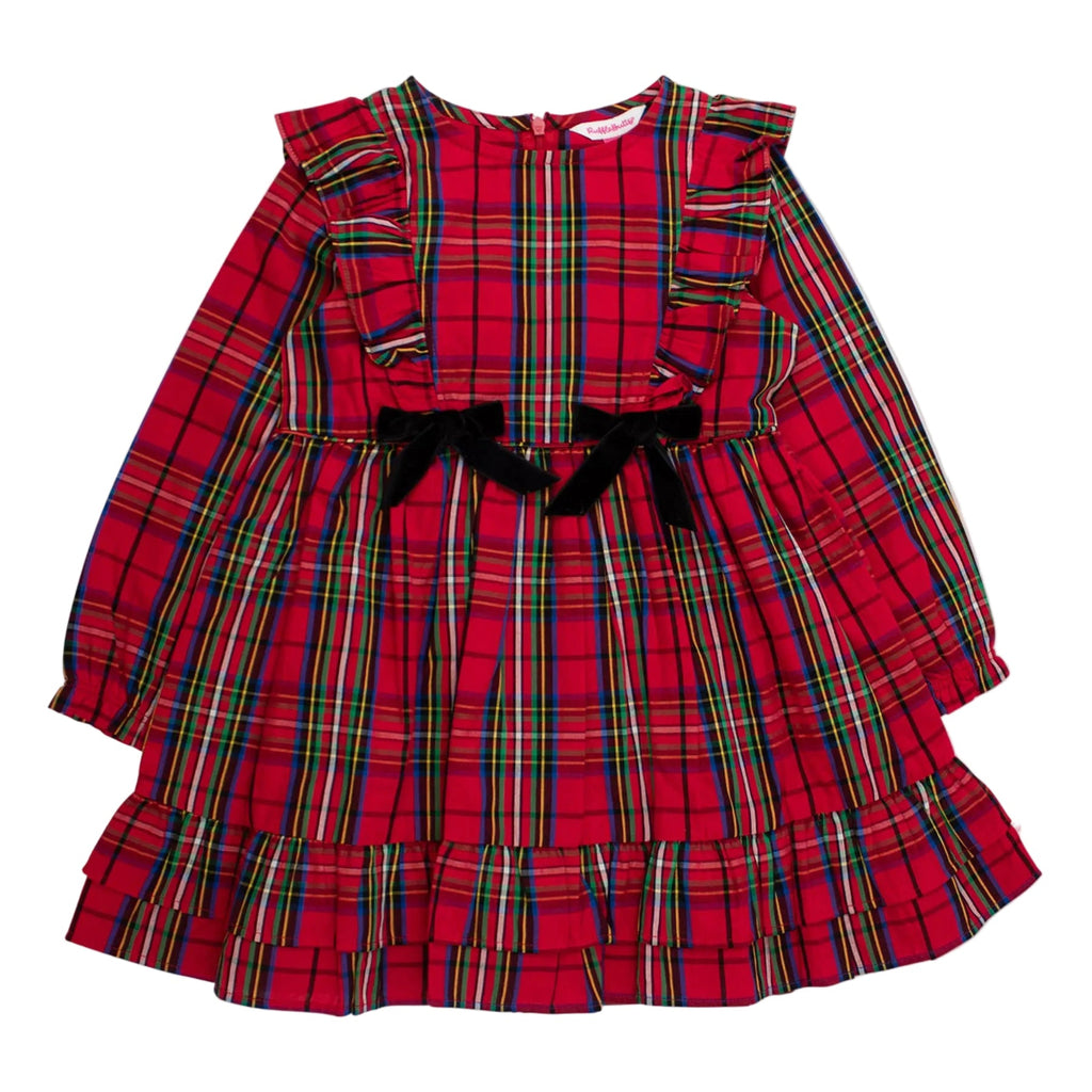 A red plaid long-sleeve dress for toddlers, featuring ruffled shoulders, a black velvet bow at the waist, and a tiered ruffle hem, shown flat on a white background.