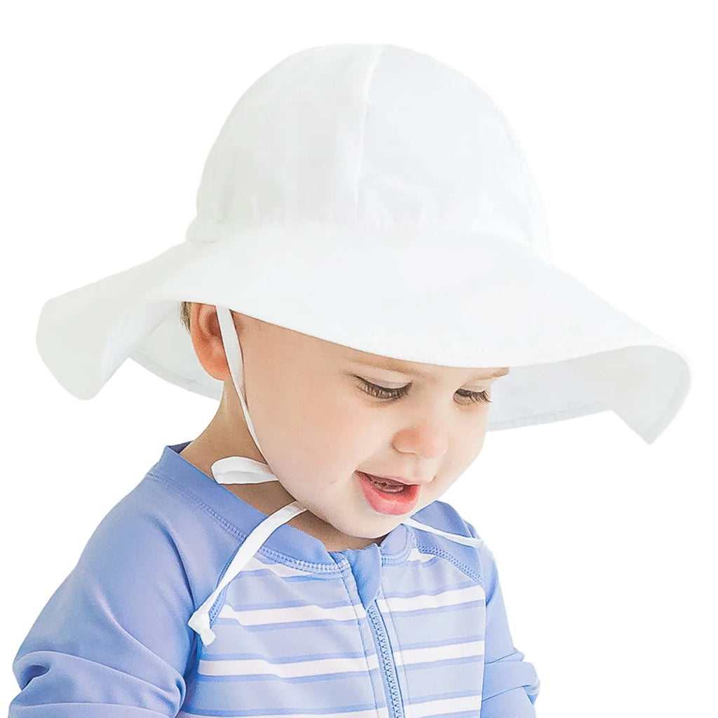 White sun hat with a chin strap