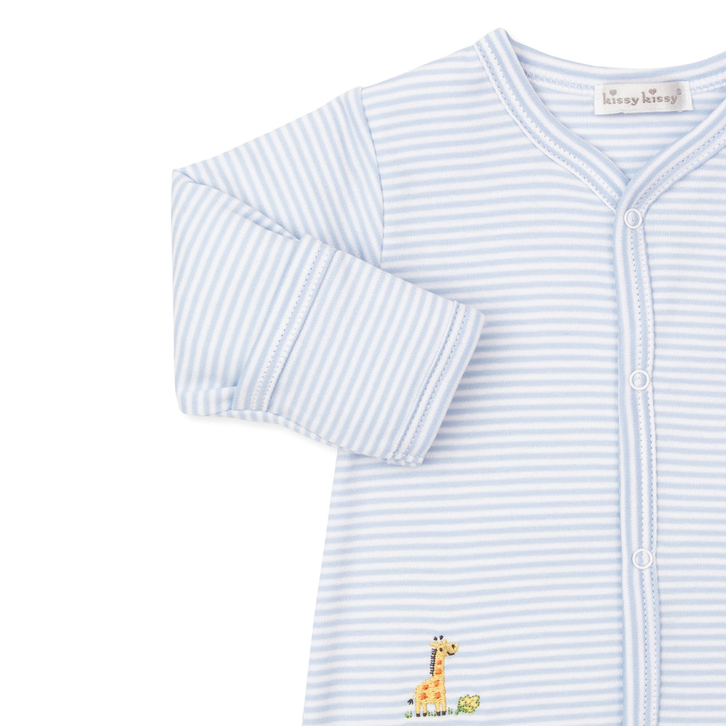Closeup of a baby boy footed sleeper in blue stripe with embroidered safari animals and a Kissy Kissy brand label