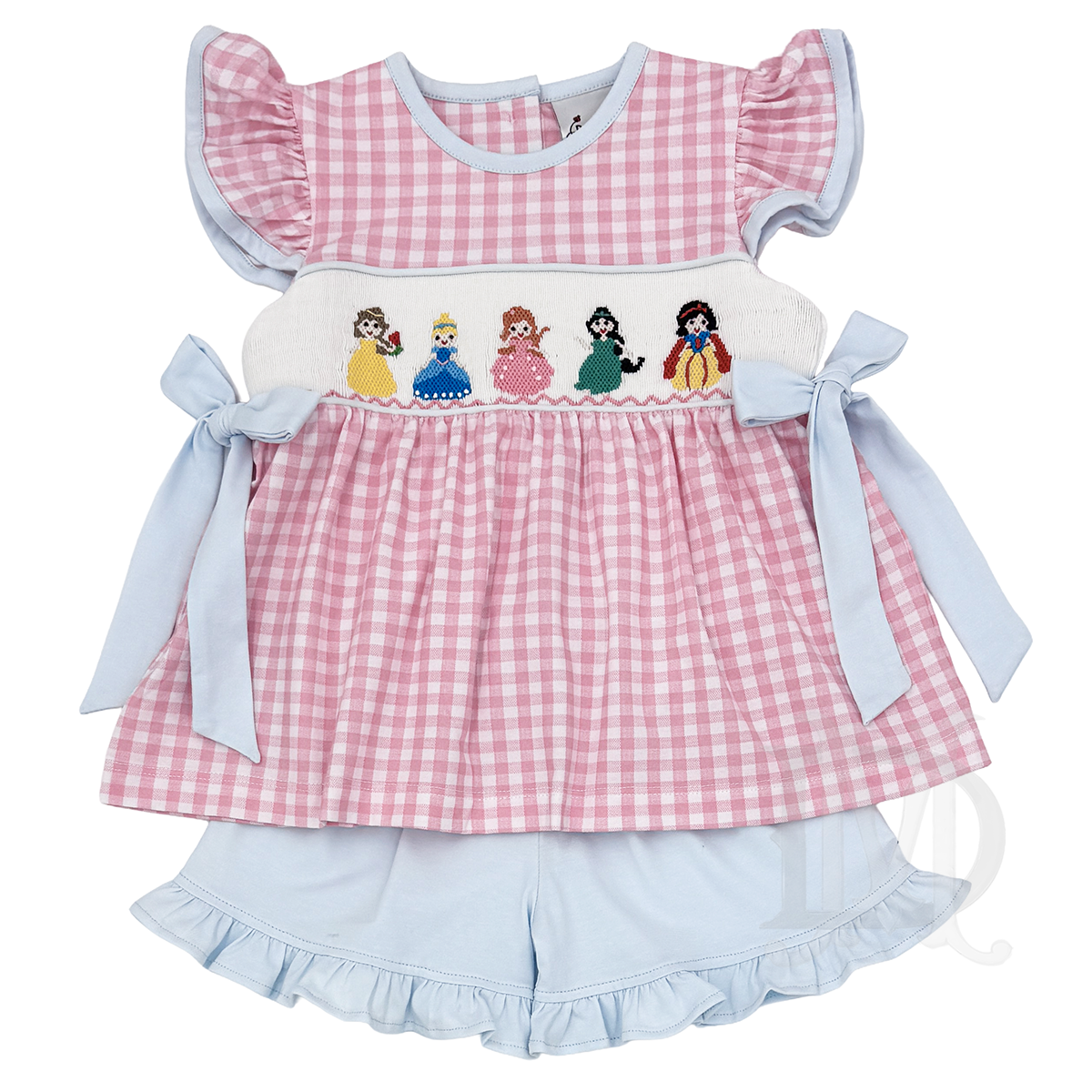 Girl's outfit with smocked princesses and side bows on a pink check shirt paired with light blue ruffled shorts. 