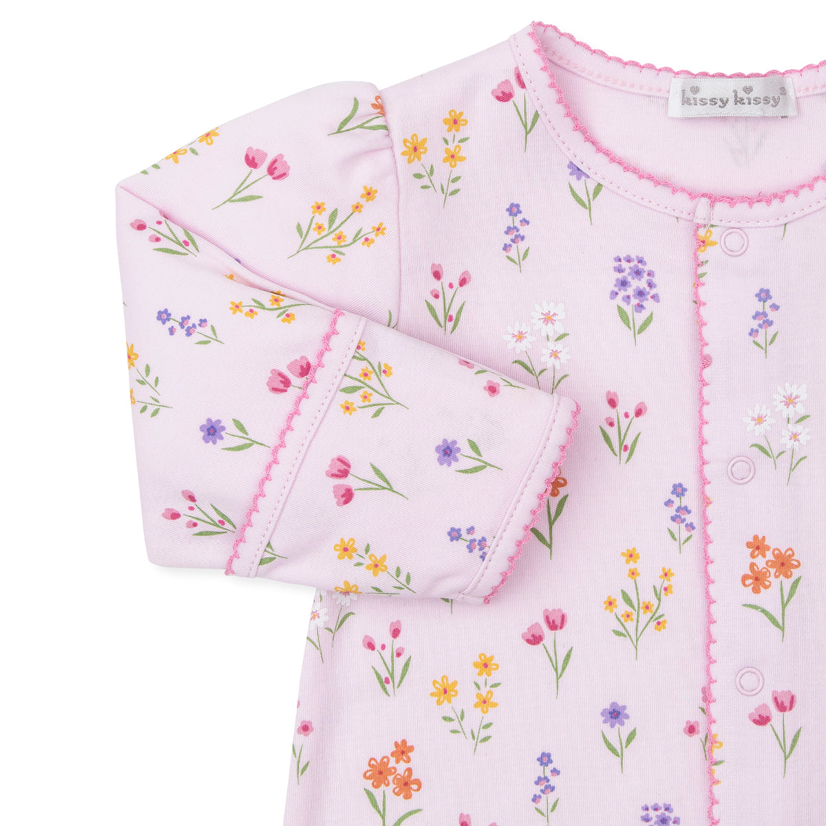 Baby girl converter gown with a pink floral pattern and pink trim