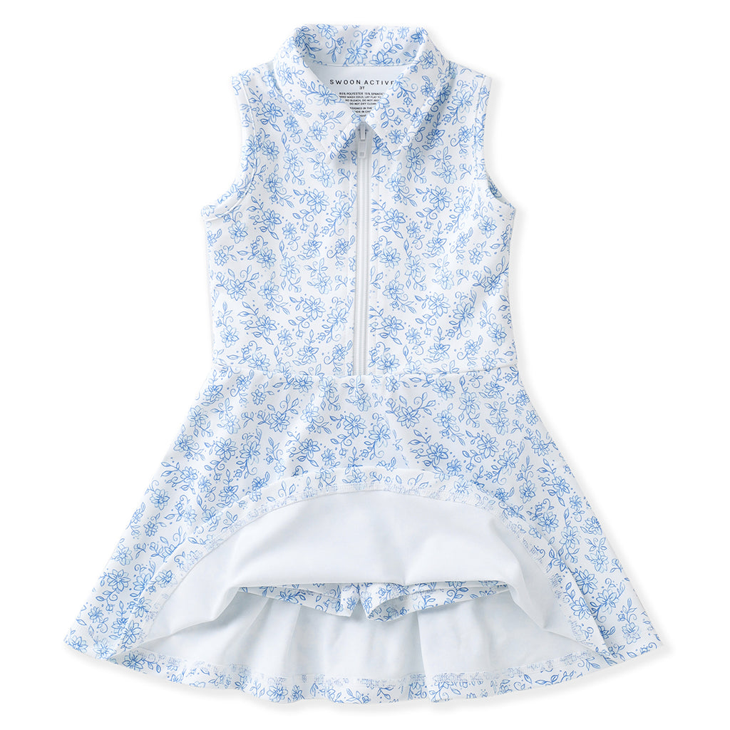 Girl’s blue chintz floral zip-front tennis dress with built-in shorts
