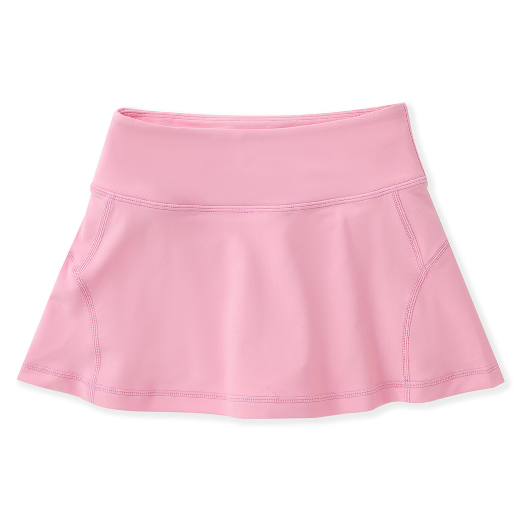 Girls pink athleisure tennis skirt with built-in shorts and back zipper pocket