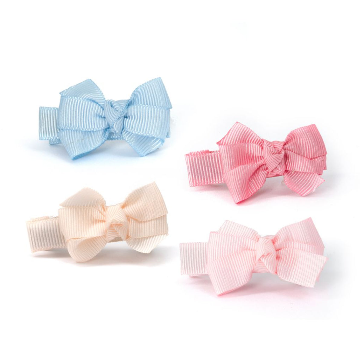 Four pastel grosgrain tiny hair bows in light blue and shades of pink for baby girl