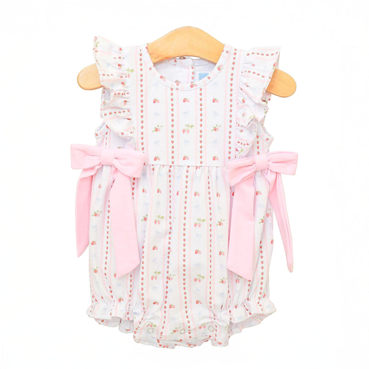 Girls white knit bubble with pink bows and a sweet strawberry print.