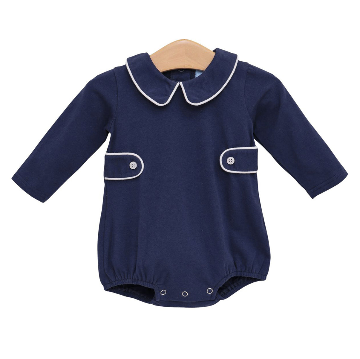 A navy blue baby boy bubble romper with white trim and side tabs.