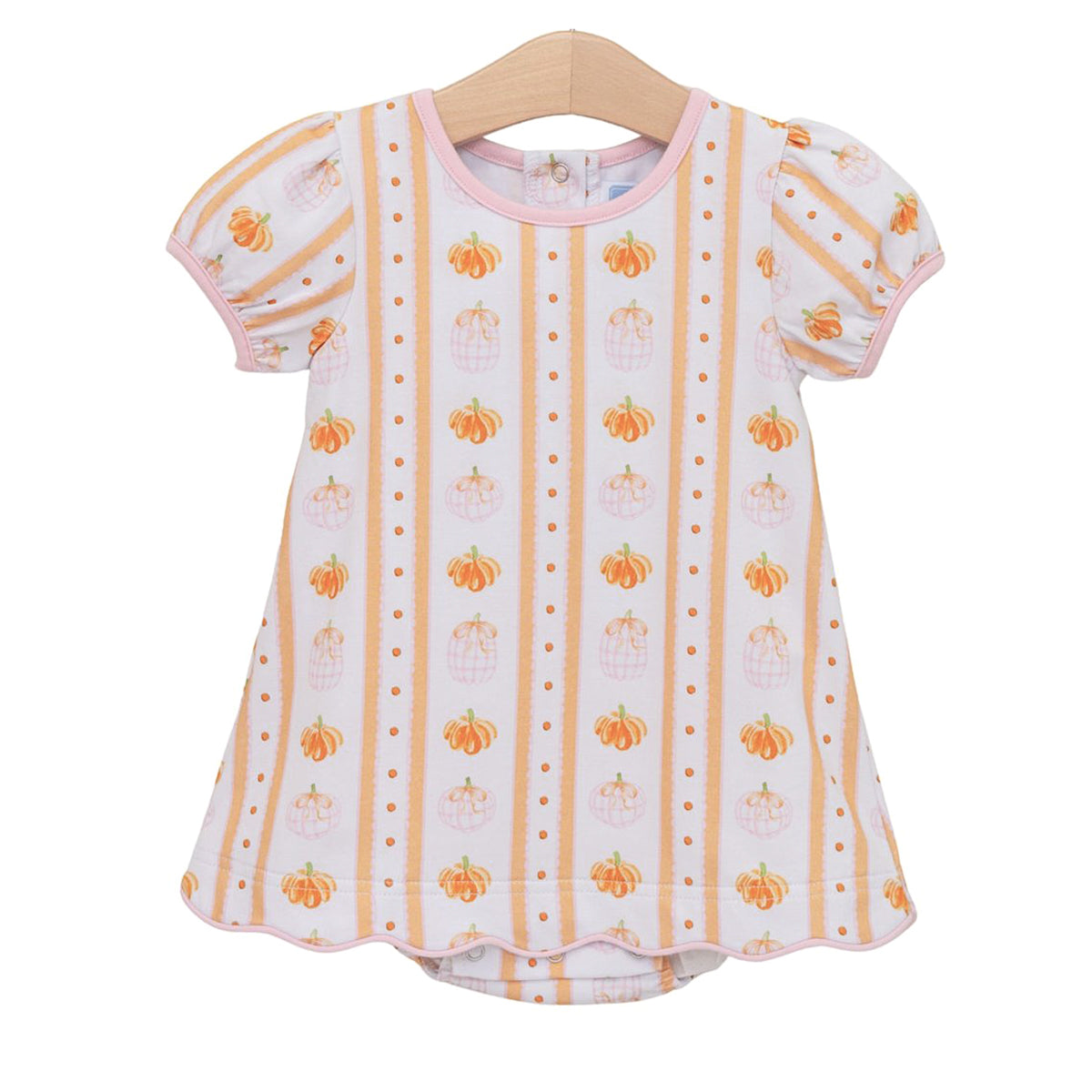 A baby girl's short-sleeve bodysuit with dress overlay with a white base, vertical stripes, and an orange and pink pumpkin pattern.