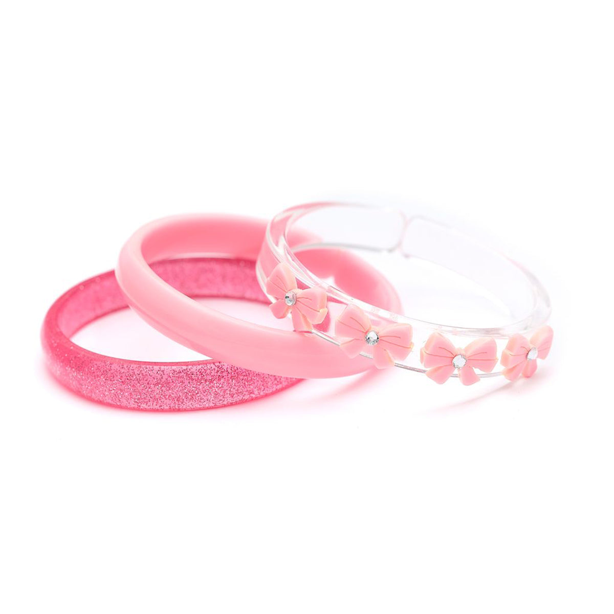 Set of pink acrylic bangle bracelets with glittery shimmer and bow designs