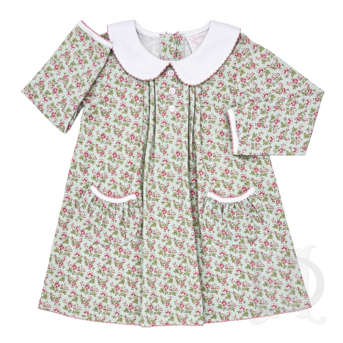 A long-sleeve baby dress with a pale green and pink Victorian floral print, featuring a white Peter Pan collar and white trim.
