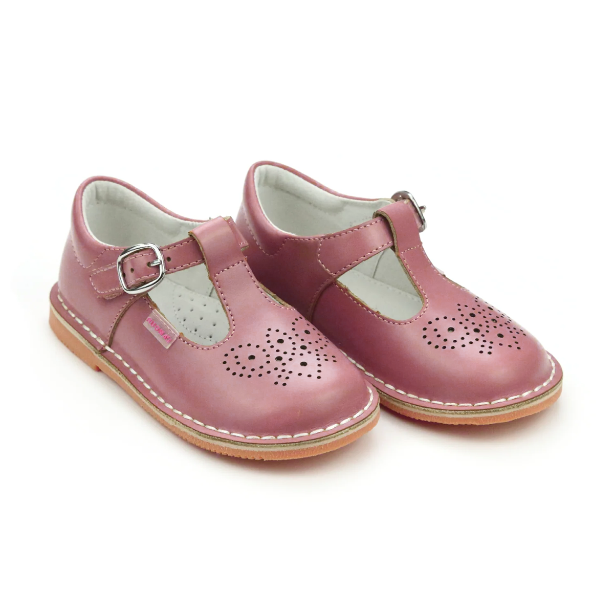 Vintage rose pink T-strap toddler girl dress shoes with a L'amour tag, faux buckle closure, and perforated design.