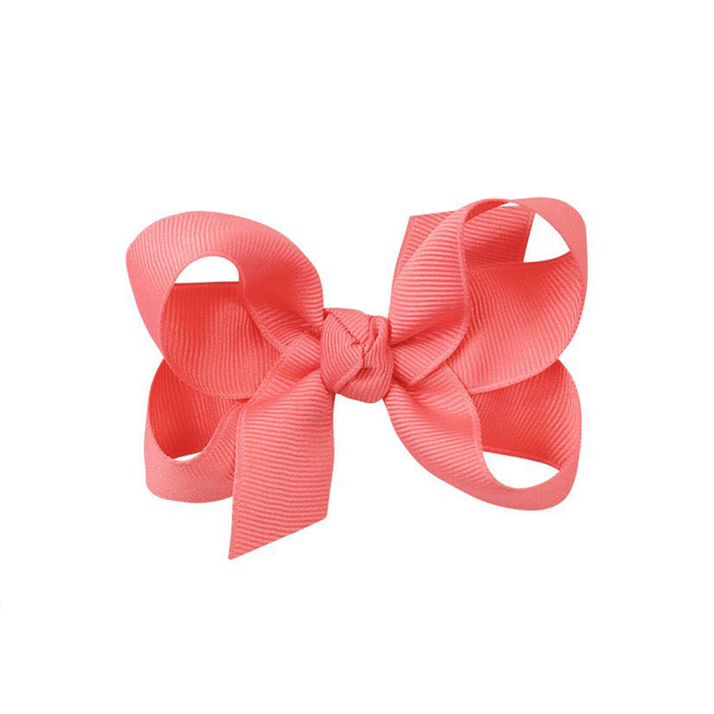 Watermelon coral grosgrain classic hair bow with double knot center.