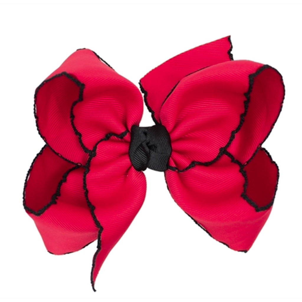 Red grosgrain classic hair bow with black double knot center and black crochet trim.